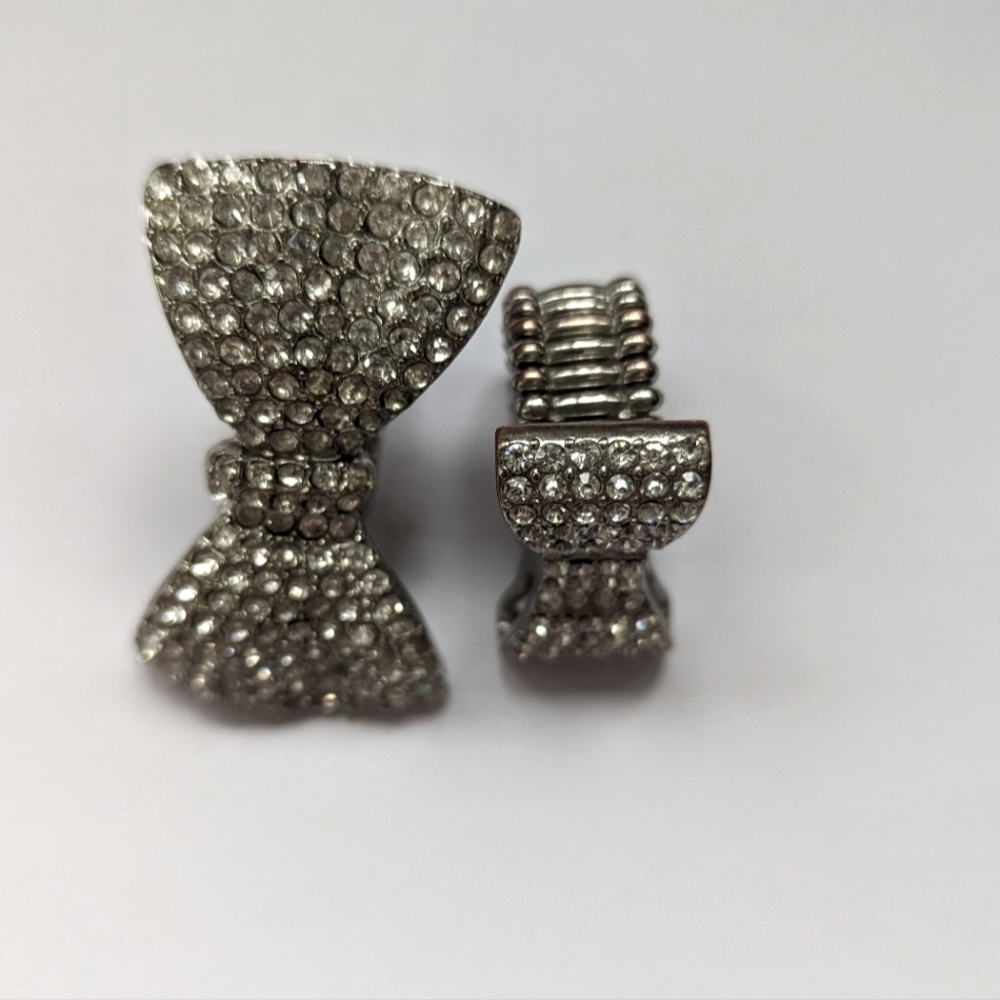Two rhinestone bow rings